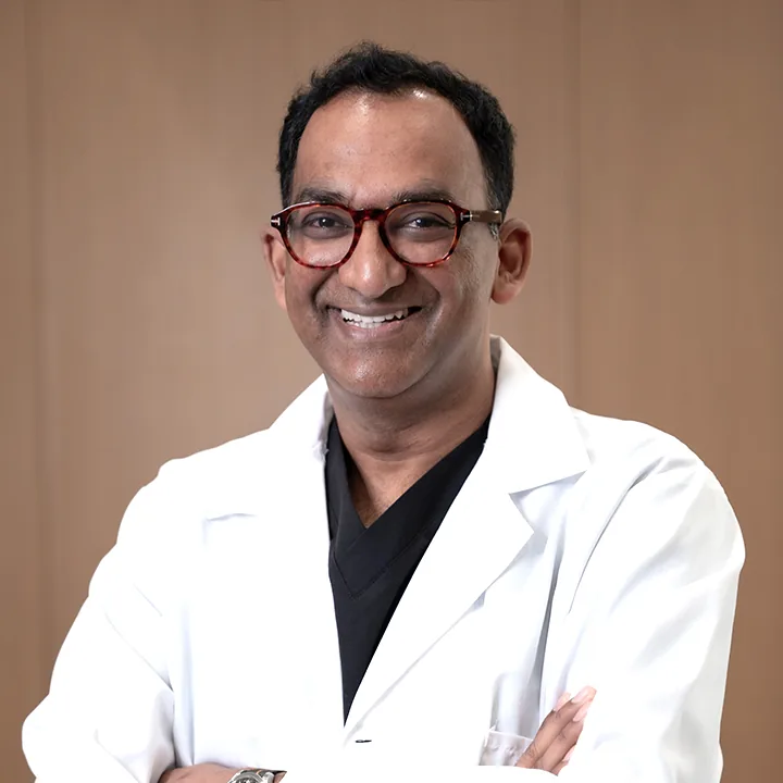 Dr. Rakesh Mantena, DDS — Lead Dentist and Implant Specialist